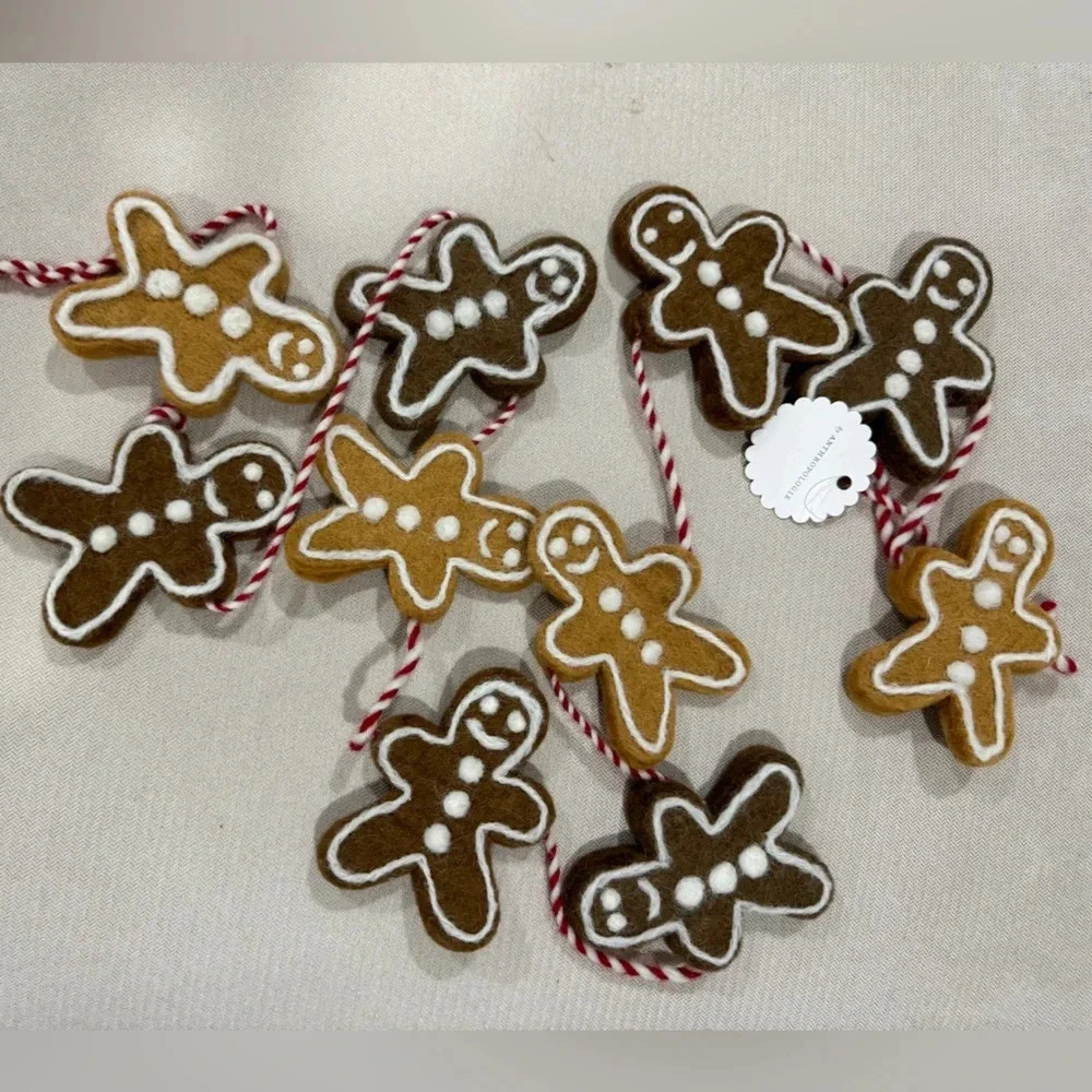 Anthropologie gingerbread men christmas garland wool decor holidays neutral home